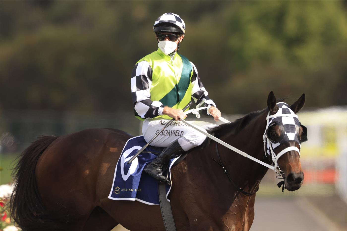 SYDNEY, AUSTRALIA - SEPTEMBER 25: Glyn Schofield on Yonkers returns to scale after winning  race 6 the Ned Whisky Shannon Stakes during Sydney Racing on Golden Rose Day at Rosehill Gardens on September 25, 2021 in Sydney, Australia. (Photo by Mark Evans/Getty Images)