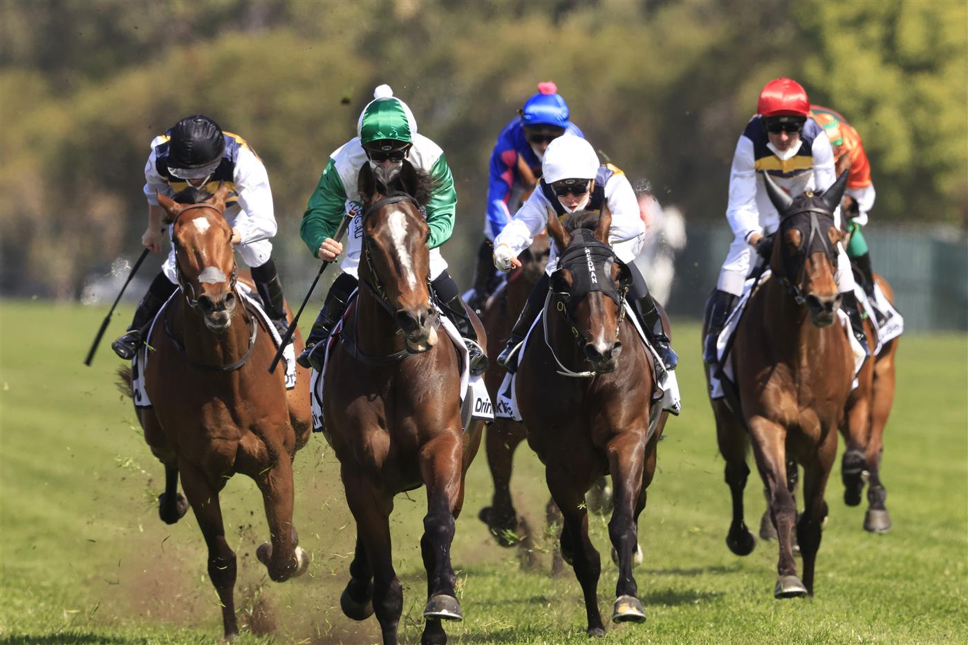 SYDNEY, AUSTRALIA - SEPTEMBER 25: Tim Clark  on Entente (green) wins race 4 the Drinkwise Colin Stephen Quality during Sydney Racing on Golden Rose Day at Rosehill Gardens on September 25, 2021 in Sydney, Australia. (Photo by Mark Evans/Getty Images)
