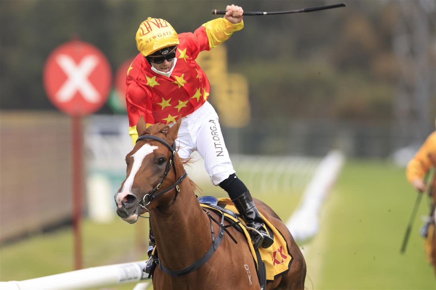 SYDNEY, AUSTRALIA - SEPTEMBER 25: Tim Clark on In The Congo wins race 8 the XXXX Golden Rose during Sydney Racing on Golden Rose Day at Rosehill Gardens on September 25, 2021 in Sydney, Australia. (Photo by Mark Evans/Getty Images)