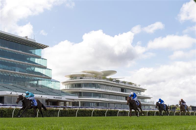 MELBOURNE, AUSTRALIA - OCTOBER 02: Damian Lane riding Get In The Spirit winning Race 1, the Darley Maribyrnong Trial Stakes during Melbourne Racing at Flemington Racecourse on October 02, 2021 in Melbourne, Australia. (Photo by Vince Caligiuri/Getty Images)