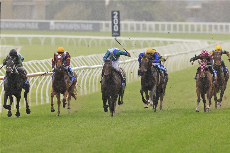 SYDNEY, AUSTRALIA - OCTOBER 02: Regan Bayliss on Never Been Kissed wins race 7 the Darley Flight Stakes during Sydney Racing on Epsom Day at Royal Randwick Racecourse on October 02, 2021 in Sydney, Australia. (Photo by Mark Evans/Getty Images)