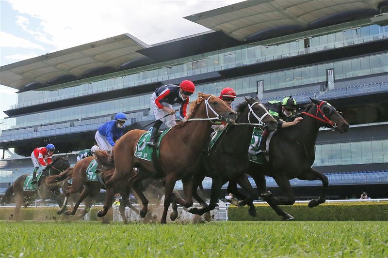 SYDNEY, AUSTRALIA - OCTOBER 02: Regan Bayliss on Private Eye (green/black) wins race 8 the TAB Epsom during Sydney Racing on Epsom Day at Royal Randwick Racecourse on October 02, 2021 in Sydney, Australia. (Photo by Mark Evans/Getty Images)