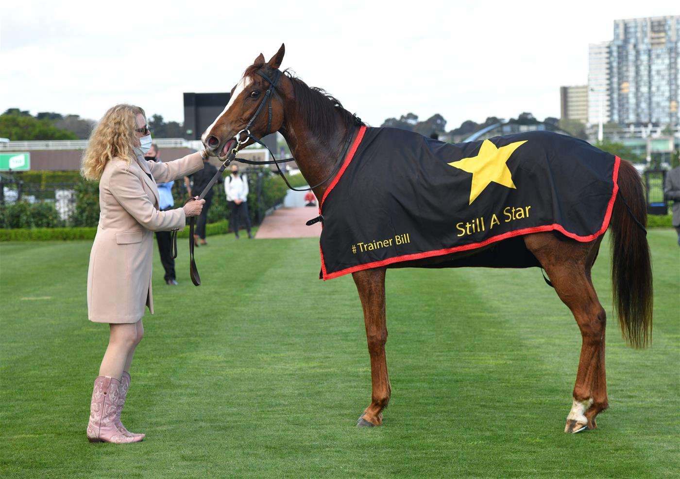 MELBOURNE, AUSTRALIA - OCTOBER 02: Monica Ryan poses with Still A Star after winning race 6, the Furphy Rose Of Kingston Stakes, during Melbourne Racing at Flemington Racecourse on October 02, 2021 in Melbourne, Australia. (Photo by Vince Caligiuri/Getty Images)