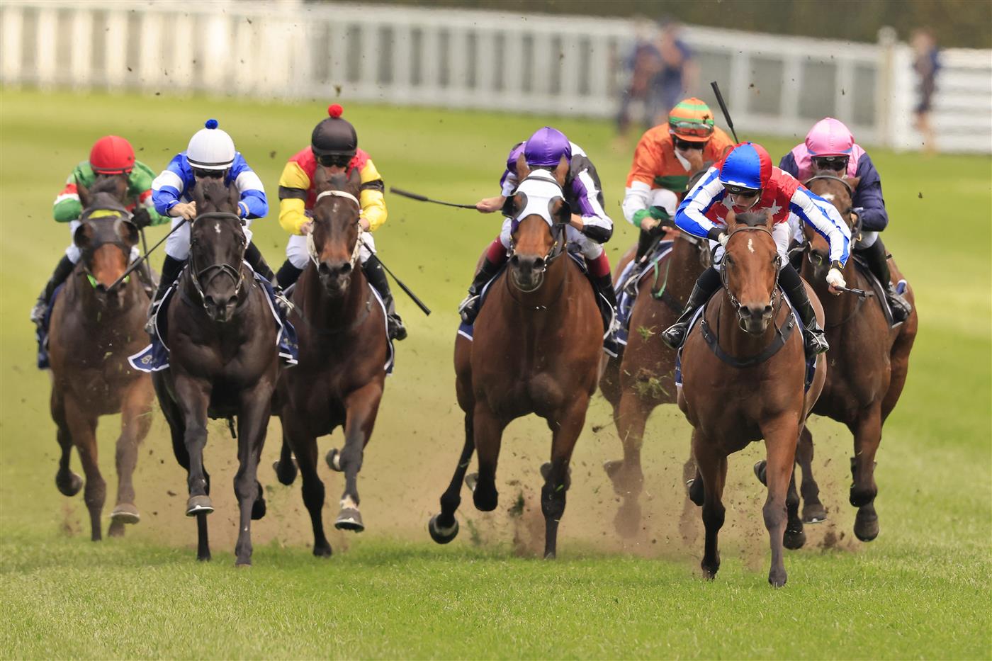 SYDNEY, AUSTRALIA - OCTOBER 02: Andrew Adkins on Fox Fighter (red/blue), wins race 1 the Midway Handicap during Sydney Racing on Epsom Day at Royal Randwick Racecourse on October 02, 2021 in Sydney, Australia. (Photo by Mark Evans/Getty Images)