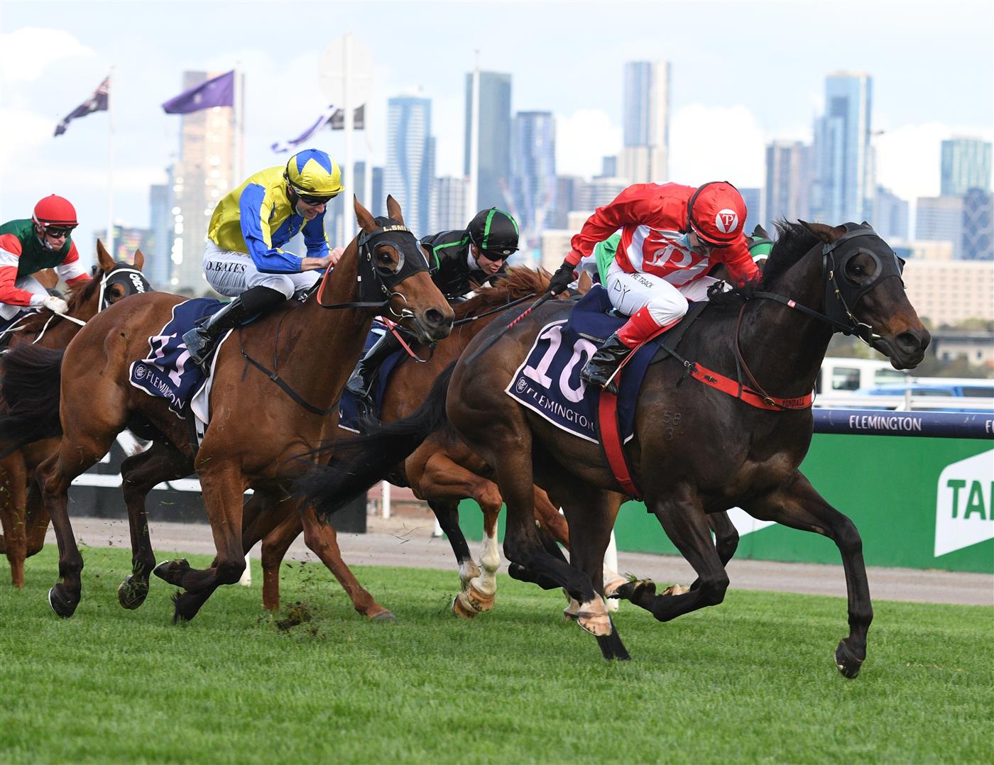 MELBOURNE, AUSTRALIA - OCTOBER 02: Dean Yendall riding Justacanta winning Race 9, the Mcgregor Portables Paris Lane Stakes, during Melbourne Racing at Flemington Racecourse on October 02, 2021 in Melbourne, Australia. (Photo by Vince Caligiuri/Getty Images)