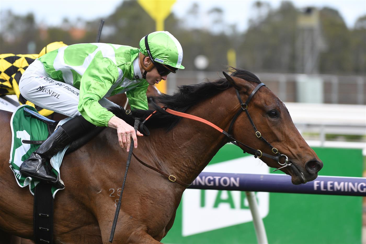 MELBOURNE, AUSTRALIA - OCTOBER 02: Jye McNeil riding Elusive Express winning Race 3, the Tab Edward Manifold Stakes, during Melbourne Racing at Flemington Racecourse on October 02, 2021 in Melbourne, Australia. (Photo by Vince Caligiuri/Getty Images)