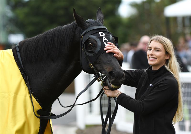 MELBOURNE, AUSTRALIA - APRIL 17: Strapper Christin Schotten with So Si Bon after winning Race 4, the Irt Vobis Gold Mile, during Melbourne Racing at Caulfield Racecourse on April 17, 2021 in Melbourne, Australia. (Photo by Vince Caligiuri/Getty Images)