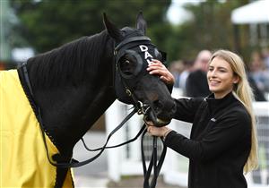 MELBOURNE, AUSTRALIA - APRIL 17: Strapper Christin Schotten with So Si Bon after winning Race 4, the Irt Vobis Gold Mile, during Melbourne Racing at Caulfield Racecourse on April 17, 2021 in Melbourne, Australia. (Photo by Vince Caligiuri/Getty Images)
