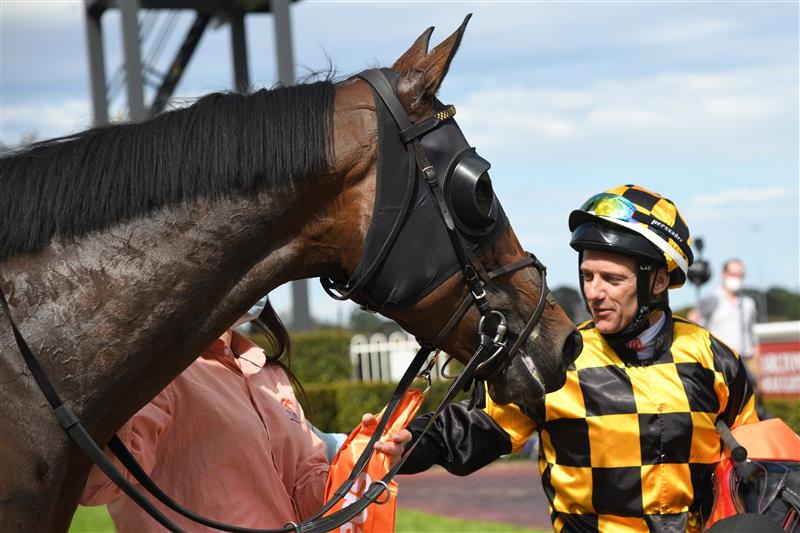 MELBOURNE, AUSTRALIA - OCTOBER 09: Brett Prebble riding Probabeel after winning race 6, the Neds Might And Power, during Melbourne Racing at Caulfield Racecourse on October 09, 2021 in Melbourne, Australia. (Photo by Vince Caligiuri/Getty Images)