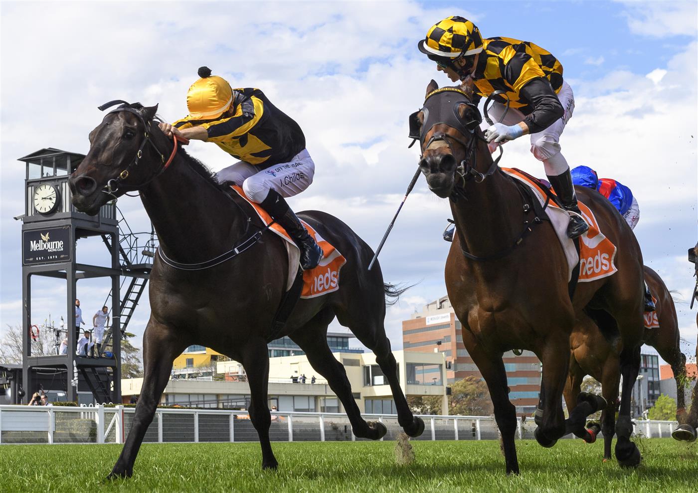 MELBOURNE, AUSTRALIA - OCTOBER 09: Brett Prebble riding Probabeel (r) defeats Jordan Childs riding Nonconformist in race 6, the Neds Might And Power, during Melbourne Racing at Caulfield Racecourse on October 09, 2021 in Melbourne, Australia. (Photo by Vince Caligiuri/Getty Images)