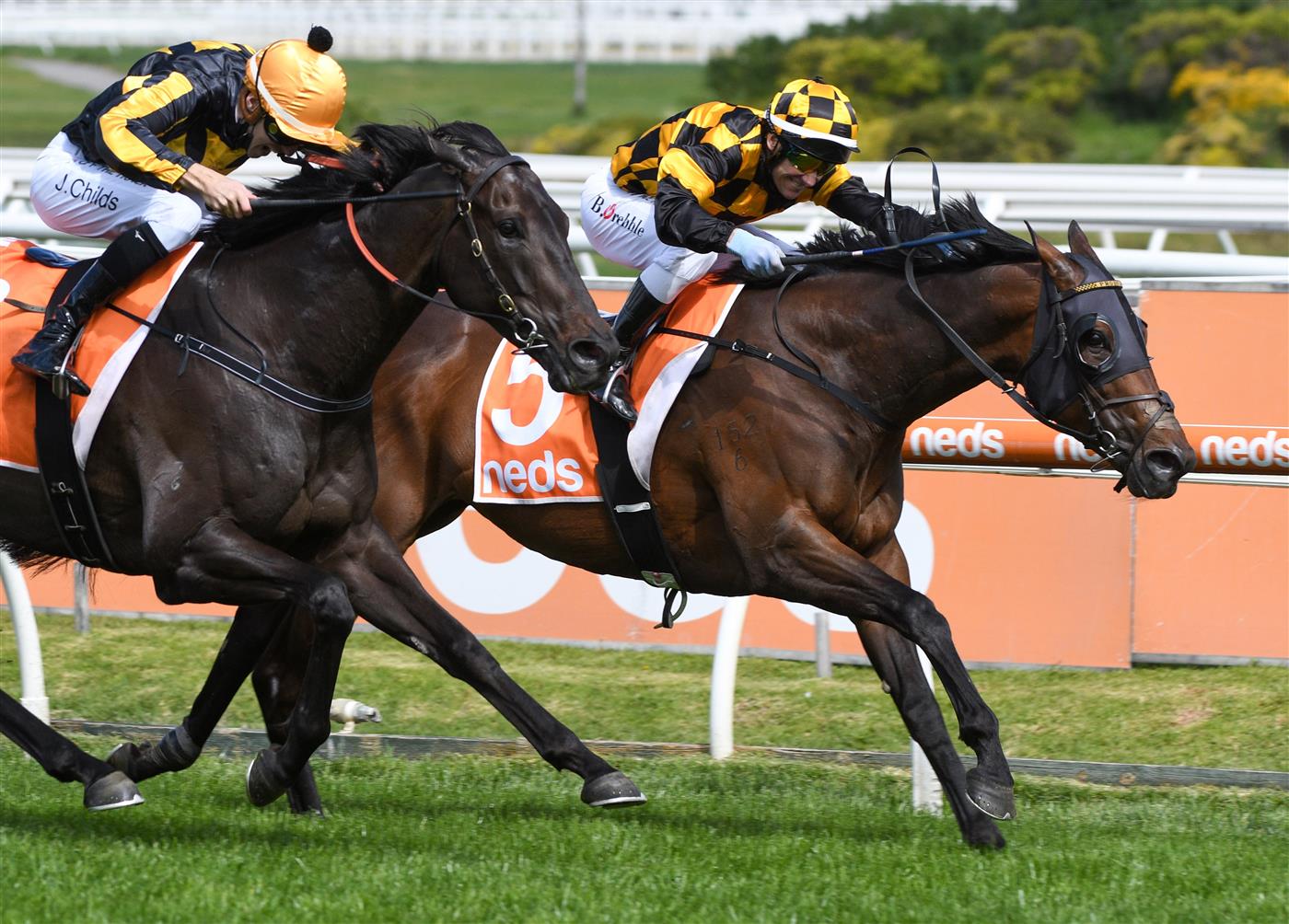MELBOURNE, AUSTRALIA - OCTOBER 09: Brett Prebble riding Probabeel defeats Jordan Childs riding Nonconformist in race 6, the Neds Might And Power, during Melbourne Racing at Caulfield Racecourse on October 09, 2021 in Melbourne, Australia. (Photo by Vince Caligiuri/Getty Images)