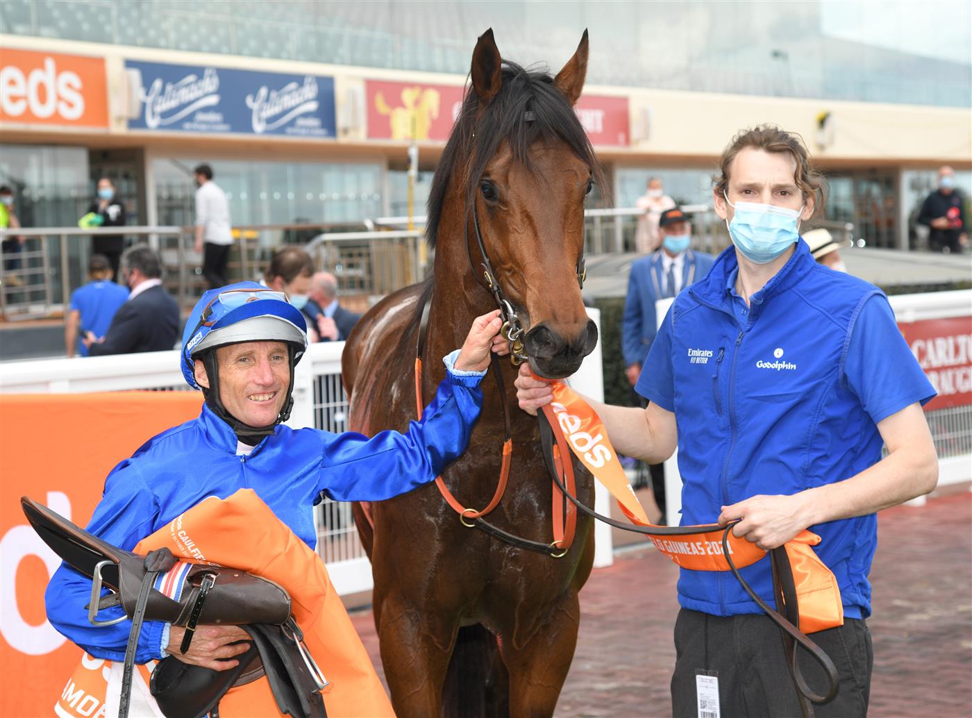 MELBOURNE, AUSTRALIA - OCTOBER 09: Damien Oliver riding Anamoe after winning Race 8, the Neds Caulfield Guineas, winning during Melbourne Racing at Caulfield Racecourse on October 09, 2021 in Melbourne, Australia. (Photo by Vince Caligiuri/Getty Images)