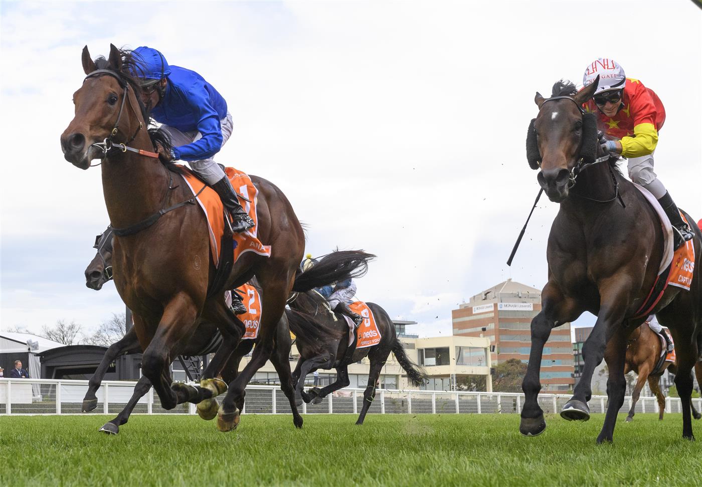 MELBOURNE, AUSTRALIA - OCTOBER 09: Damien Oliver riding Anamoe defeats Luke Currie riding Captivant in  Race 8, the Neds Caulfield Guineas, winning during Melbourne Racing at Caulfield Racecourse on October 09, 2021 in Melbourne, Australia. (Photo by Vince Caligiuri/Getty Images)