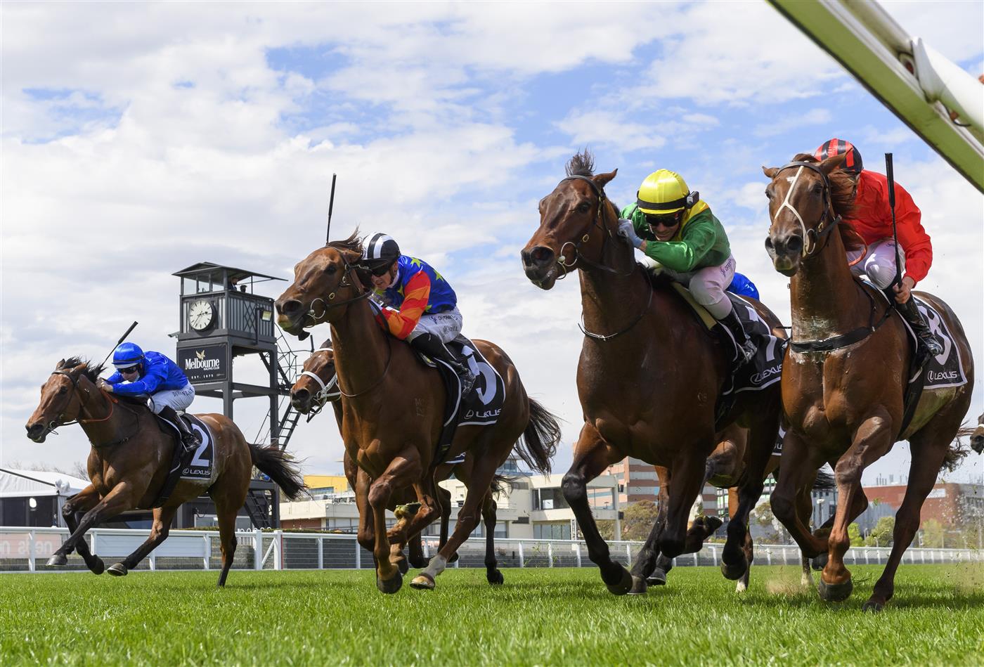 MELBOURNE, AUSTRALIA - OCTOBER 09: Luke Currie riding Savatoxl (ctr) defeats Michael Dee riding Dosh in race 5,  the Lexus Schillaci Stakes, during Melbourne Racing at Caulfield Racecourse on October 09, 2021 in Melbourne, Australia. (Photo by Vince Caligiuri/Getty Images)