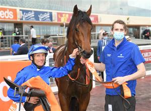 MELBOURNE, AUSTRALIA - OCTOBER 09: Damien Oliver riding Anamoe after winning Race 8, the Neds Caulfield Guineas, winning during Melbourne Racing at Caulfield Racecourse on October 09, 2021 in Melbourne, Australia. (Photo by Vince Caligiuri/Getty Images)