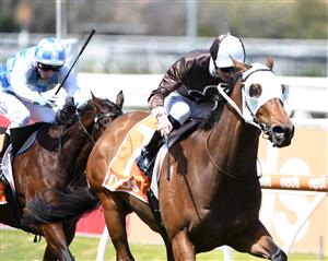 MELBOURNE, AUSTRALIA - OCTOBER 09: Jye McNeil riding Lombardo winning Race 3, the Neds Village Stakes, during Melbourne Racing at Caulfield Racecourse on October 09, 2021 in Melbourne, Australia. (Photo by Vince Caligiuri/Getty Images)