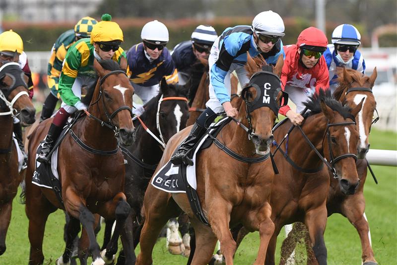 MELBOURNE, AUSTRALIA - OCTOBER 13: General view of riders  during Thousand Guineas Day at Caulfield Racecourse on October 13, 2021 in Melbourne, Australia. (Photo by Vince Caligiuri/Getty Images)