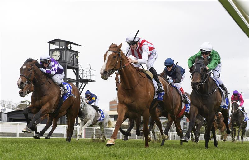MELBOURNE, AUSTRALIA - OCTOBER 13: Jye McNeil riding Agreeable winning  race 5,  the Hyland Race Colours Handicap, during Thousand Guineas Day at Caulfield Racecourse on October 13, 2021 in Melbourne, Australia. (Photo by Vince Caligiuri/Getty Images)