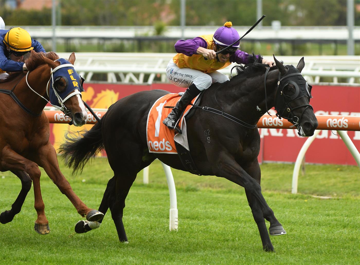 MELBOURNE, AUSTRALIA - OCTOBER 13: Jordan Childs riding Rhinoceros winning Race 1, the Thoroughbred Breeders Vic Handicap, during Thousand Guineas Day at Caulfield Racecourse on October 13, 2021 in Melbourne, Australia. (Photo by Vince Caligiuri/Getty Images)