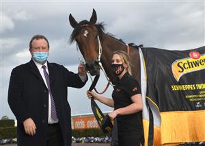 MELBOURNE, AUSTRALIA - OCTOBER 13: Trainer Wayne Hawkes poses with Yearning after winning Race 7, the Schweppes Thousand Guineas,  during Thousand Guineas Day at Caulfield Racecourse on October 13, 2021 in Melbourne, Australia. (Photo by Vince Caligiuri/Getty Images)