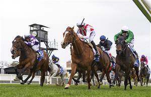 MELBOURNE, AUSTRALIA - OCTOBER 13: Jye McNeil riding Agreeable winning  race 5,  the Hyland Race Colours Handicap, during Thousand Guineas Day at Caulfield Racecourse on October 13, 2021 in Melbourne, Australia. (Photo by Vince Caligiuri/Getty Images)