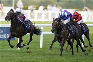 ASCOT, ENGLAND - OCTOBER 16: Jim Crowley riding Baaeed (blue/white) win The Queen Elizabeth II Stakes during the Qipco British Champions Day at Ascot Racecourse on October 16, 2021 in Ascot, England. (Photo by Alan Crowhurst/Getty Images)