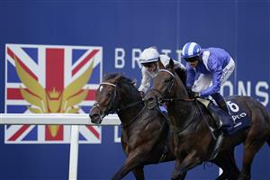 ASCOT, ENGLAND - OCTOBER 16: Jim Crowley riding Baaeed (blue/white) win The Queen Elizabeth II Stakes during the Qipco British Champions Day at Ascot Racecourse on October 16, 2021 in Ascot, England. (Photo by Alan Crowhurst/Getty Images)