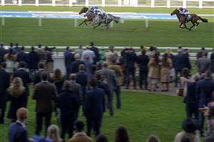 ASCOT, ENGLAND - OCTOBER 16: Jim Crowley riding Eshaada (L, blue) win The Qipco British Champions Fillies & Mares Stakes during the Qipco British Champions Day at Ascot Racecourse on October 16, 2021 in Ascot, England. (Photo by Alan Crowhurst/Getty Images)