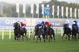 ASCOT, ENGLAND - OCTOBER 16: Jim Crowley riding Baaeed (blue/white) win The Queen Elizabeth II Stakes during the Qipco British Champions Day at Ascot Racecourse on October 16, 2021 in Ascot, England. (Photo by Alan Crowhurst/Getty Images)