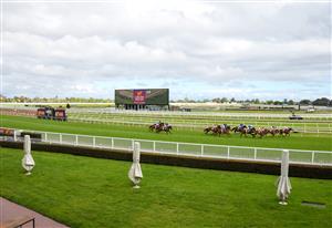 MELBOURNE, AUSTRALIA - OCTOBER 16: Ben Allen riding Mileva winning Race 8, the Carlton Draught Alinghi Stakes, during Caulfield Cup Day at Caulfield Racecourse on October 16, 2021 in Melbourne, Australia. Race meetings are still held with no crowds in attendance due to Covid restrictions. (Photo by Vince Caligiuri/Getty Images)