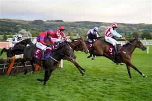 CHELTENHAM, ENGLAND - OCTOBER 22: Davy Russell riding Top Bandit (C, red cap) clear the last to win The Foundation Developments Maiden Hurdle at Cheltenham Racecourse on October 22, 2021 in Cheltenham, England. (Photo by Alan Crowhurst/Getty Images)