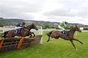 CHELTENHAM, ENGLAND - OCTOBER 22: Aidan Coleman riding Camprond (R) clear the last to win The Ballymore Novices' Hurdle at Cheltenham Racecourse on October 22, 2021 in Cheltenham, England. (Photo by Alan Crowhurst/Getty Images)