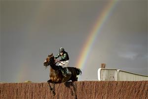 CHELTENHAM, ENGLAND - OCTOBER 22: Pa King riding Strictlyadancer clear the last to win The Andy Stewart Memorial Amateur Jockeys' Handicap Chase at Cheltenham Racecourse on October 22, 2021 in Cheltenham, England. (Photo by Alan Crowhurst/Getty Images)