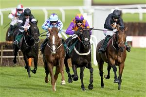 CHELTENHAM, ENGLAND - OCTOBER 22: Sean Bowen riding Bardenstown Lad (light blue) clear the last to win The 888sport What's Your Thinking Novices' Hurdle at Cheltenham Racecourse on October 22, 2021 in Cheltenham, England. (Photo by Alan Crowhurst/Getty Images)