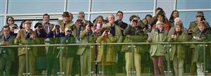 CHELTENHAM, ENGLAND - OCTOBER 22: Watching the action at Cheltenham Racecourse on October 22, 2021 in Cheltenham, England. (Photo by Alan Crowhurst/Getty Images)