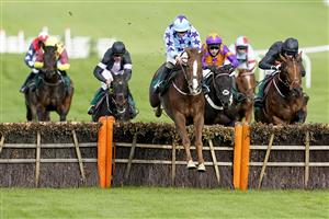 CHELTENHAM, ENGLAND - OCTOBER 22: Sean Bowen riding Bardenstown Lad (light blue) clear the last to win The 888sport What's Your Thinking Novices' Hurdle at Cheltenham Racecourse on October 22, 2021 in Cheltenham, England. (Photo by Alan Crowhurst/Getty Images)
