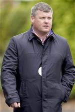 CHELTENHAM, ENGLAND - OCTOBER 22: Gordon Elliott poses at Cheltenham Racecourse on October 22, 2021 in Cheltenham, England. (Photo by Alan Crowhurst/Getty Images)