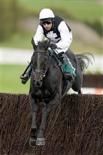 CHELTENHAM, ENGLAND - OCTOBER 22: Harry Skelton riding Third Time Lucki clear the last to win The squareintheair.com Novices' Chase at Cheltenham Racecourse on October 22, 2021 in Cheltenham, England. (Photo by Alan Crowhurst/Getty Images)