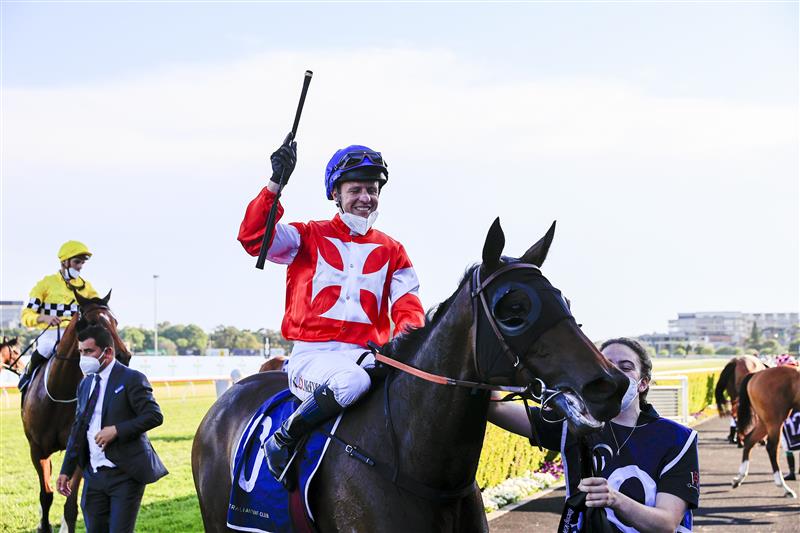SYDNEY, AUSTRALIA - OCTOBER 23: Kerrin McEvoy on Icebath salutes after winning race 9 The Invitation during Sydney Racing at Royal Randwick Racecourse on October 23, 2021 in Sydney, Australia. (Photo by Mark Evans/Getty Images)