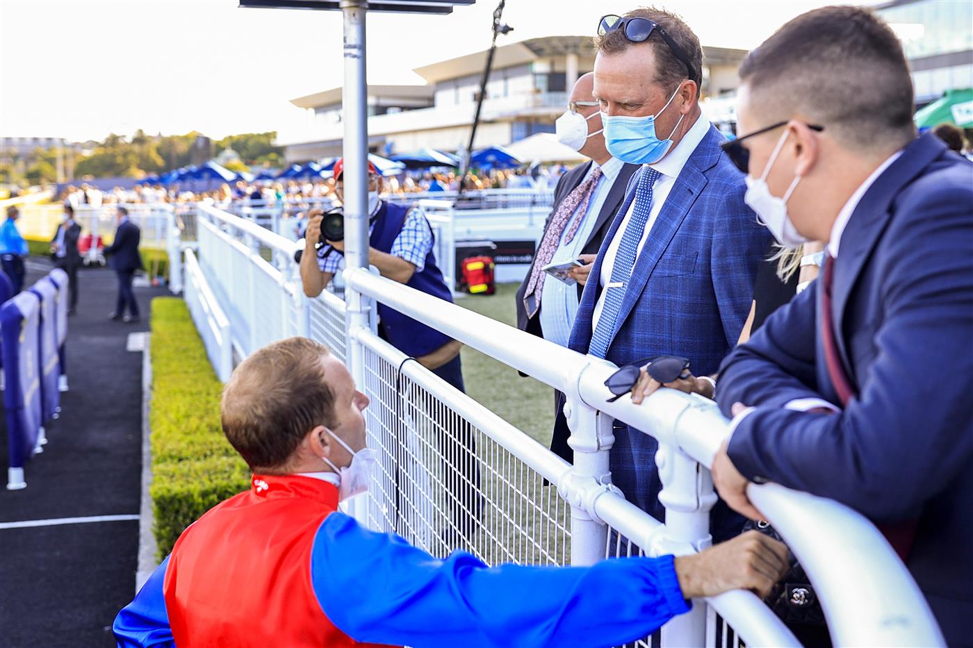 SYDNEY, AUSTRALIA - OCTOBER 23: Tommy Berry talks to trainer Michael Hawkes after winning race 8 the Bondi Stakes on Hilal during Sydney Racing at Royal Randwick Racecourse on October 23, 2021 in Sydney, Australia. (Photo by Mark Evans/Getty Images)