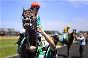 SYDNEY, AUSTRALIA - OCTOBER 23: Tim Clark on Kitzbuhel returns to scale after winning race 2 the TAB Highway Handicap during Sydney Racing at Royal Randwick Racecourse on October 23, 2021 in Sydney, Australia. (Photo by Mark Evans/Getty Images)