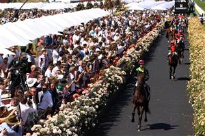 MELBOURNE, AUSTRALIA - NOVEMBER 02: Horses and jockeys head out to the barrier ahead of race 7, the Lexus Melbourne Cup during 2021 Melbourne Cup Day at Flemington Racecourse on November 02, 2021 in Melbourne, Australia. (Photo by Robert Cianflone/Getty Images)