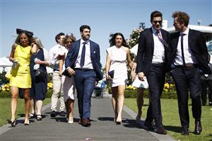 MELBOURNE, AUSTRALIA - NOVEMBER 02: AFL Melbourne Demons footballer Christian Petracca (centre) is seen during 2021 Melbourne Cup Day at Flemington Racecourse on November 02, 2021 in Melbourne, Australia. (Photo by Daniel Pockett/Getty Images)