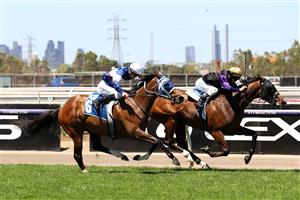 MELBOURNE, AUSTRALIA - NOVEMBER 02: Jarrod Fry riding #3 Milton Park wins race 4, the Furphy Plate ahead of Damien Thornton riding #6 Skyman during 2021 Melbourne Cup Day at Flemington Racecourse on November 02, 2021 in Melbourne, Australia. (Photo by Robert Cianflone/Getty Images)