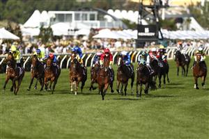 MELBOURNE, AUSTRALIA - NOVEMBER 02: Kerrin McEvoy riding #14 Quantico wins race 10, the MSS Security Sprint during 2021 Melbourne Cup Day at Flemington Racecourse on November 02, 2021 in Melbourne, Australia. (Photo by Darrian Traynor/Getty Images)