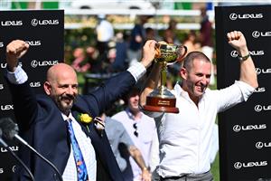 MELBOURNE, AUSTRALIA - NOVEMBER 02: Verry Elleegant owners Brae Sokolski and Ozzie Kheir celebrate with the Lexus Melbourne Cup after James Mcdonald rode #4 Verry Elleegant to victory in race 7, the Lexus Melbourne Cup during 2021 Melbourne Cup Day at Flemington Racecourse on November 02, 2021 in Melbourne, Australia. (Photo by Quinn Rooney/Getty Images)