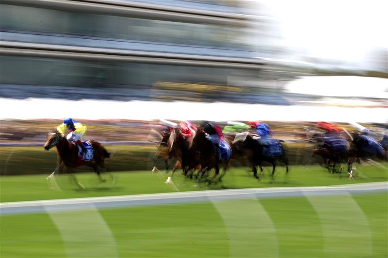 MELBOURNE, AUSTRALIA - NOVEMBER 04: Craig Williams riding #18 See You In Heaven leads the field in race 3, the Darley Ottawa Stakes during 2021 Oaks Day at Flemington Racecourse on November 04, 2021 in Melbourne, Australia. (Photo by Robert Cianflone/Getty Images)