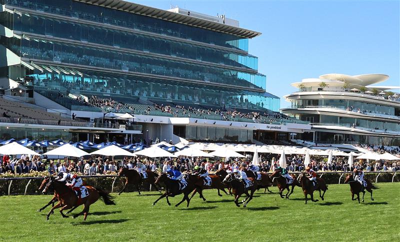 MELBOURNE, AUSTRALIA - NOVEMBER 04: Dean Yendall riding #2 Halvorsen leads Damian Lane riding #8 Malkovich to win race 6, the G.H.Mumm Century Stakes during 2021 Oaks Day at Flemington Racecourse on November 04, 2021 in Melbourne, Australia. (Photo by Robert Cianflone/Getty Images)