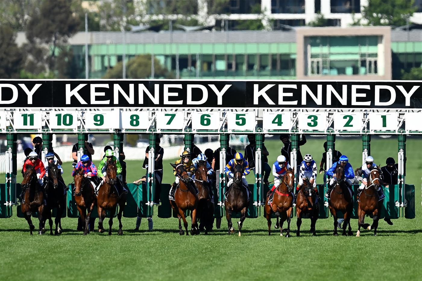 MELBOURNE, AUSTRALIA - NOVEMBER 04: The field jump the barrier in race 8, the Kennedy Oaks during 2021 Oaks Day at Flemington Racecourse on November 04, 2021 in Melbourne, Australia. (Photo by Quinn Rooney/Getty Images)