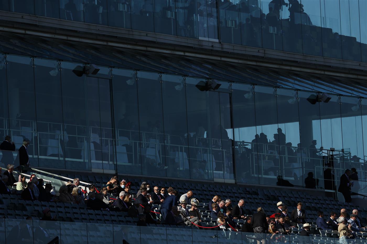 MELBOURNE, AUSTRALIA - NOVEMBER 04: Race goers are seen during 2021 Oaks Day at Flemington Racecourse on November 04, 2021 in Melbourne, Australia. (Photo by Darrian Traynor/Getty Images)